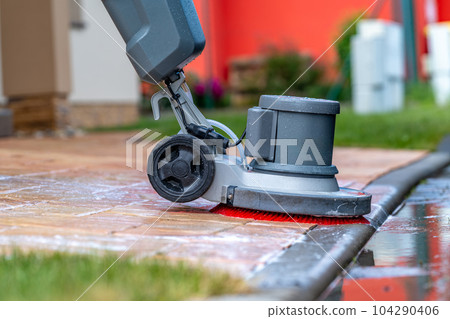 manual cleaning of concrete and stone pavements with a mechanical brush and foam manual cleaning of concrete and stone pavements with a mechanical brush and foam 104290406