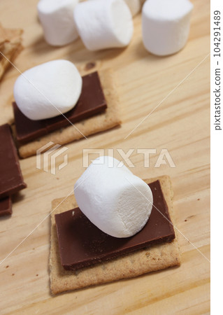 Smores. Marshmallow with Chocolate and Graham Crackers Smores. Marshmallow with Chocolate and Graham Crackers 104291489