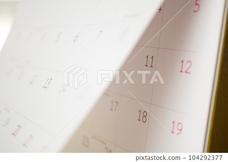 Abstract blur calendar page flipping sheet close up background business schedule planning appointment meeting concept Abstract blur calendar page flipping sheet close up background business schedule planning appointment meeting concept 104292377