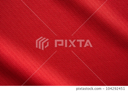 Red sports clothing fabric football jersey texture close up 104292451