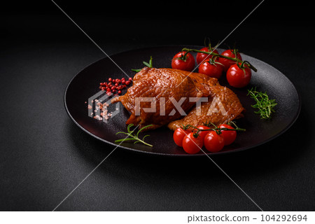 Delicious fried or smoked chicken thighs grilled with spices and herbs Delicious fried or smoked chicken thighs grilled with spices and herbs 104292694
