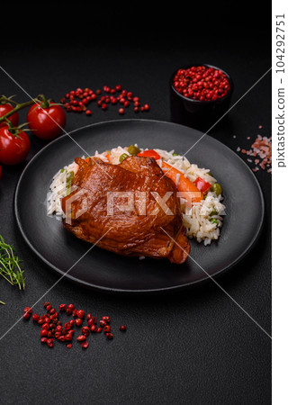 Delicious boiled rice with chicken and vegetables or risotto with salt, spices and herbs Delicious boiled rice with chicken and vegetables or risotto with salt, spices and herbs 104292751