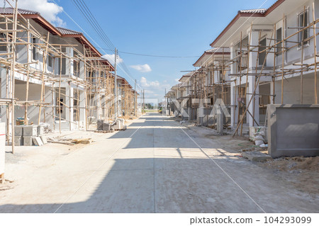 construction residential new house in progress at building site housing estate development 104293099