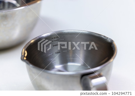 water in a metal cup water in a metal cup 104294771