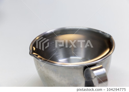 water in measuring cup water in measuring cup 104294775