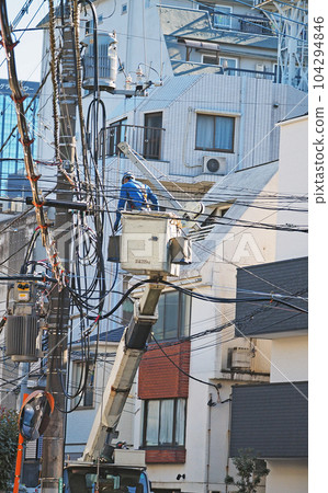 Work at height: Laying electric wires Work at height: Laying electric wires 104294846