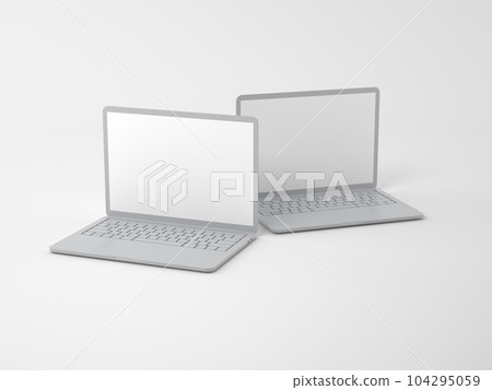 Two thin open laptops on a light 104295059