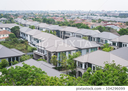 Townhouses on the outskirts of Bangkok, Thailand. Logos removed from the image. 104296099