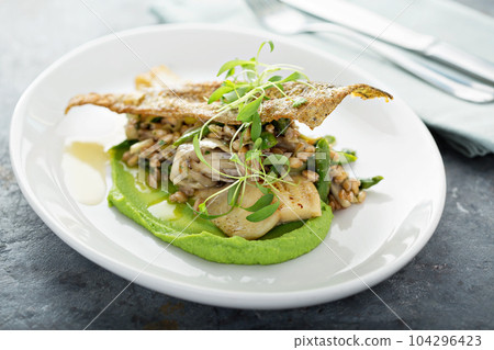 Gourmet grilled trout with crisped skin Gourmet grilled trout with crisped skin 104296423