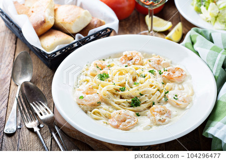 Fettuccine Alfredo with shrimp Fettuccine Alfredo with shrimp 104296477