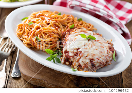 Veal Parmigiana with spaghetti Veal Parmigiana with spaghetti 104296482