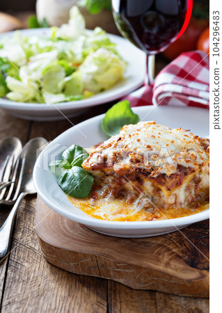 Traditional lasagna with bolognese sauce Traditional lasagna with bolognese sauce 104296483