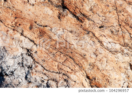 Texture of cracked brown stone 104296957