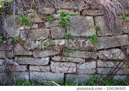 Closeup of rough gray concrete wall background 104296985