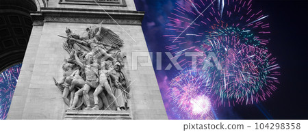 Celebratory colorful fireworks over the Arc de Triomphe, Paris, France 104298358