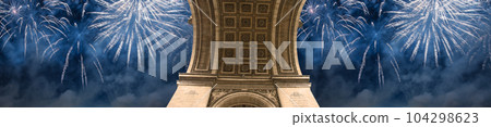 Celebratory colorful fireworks over the Arc de Triomphe, Paris, France 104298623