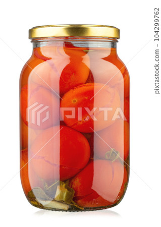 Canned tomatoes in a jar. Isolated on white background. Canned tomatoes in a jar. Isolated on white background. 104299762