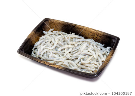 Dried whitebait in a plastic container [white background/clipping] 104300197