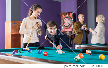 people having pool game people having pool game 104300419