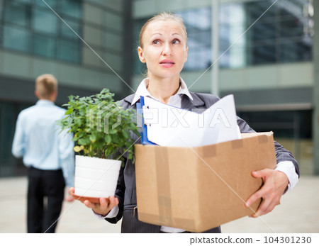 Businesswoman is standing happy near office Businesswoman is standing happy near office 104301230