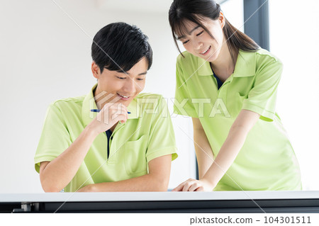 Young care workers undergoing training Young care workers undergoing training 104301511