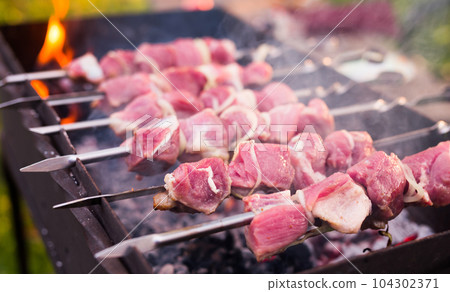 Shish kebab meat on skewers Shish kebab meat on skewers 104302371