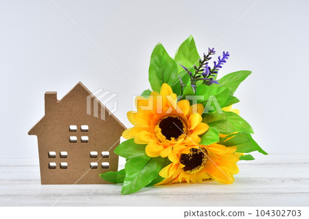 Summer image with sunflowers and house Summer image with sunflowers and house 104302703