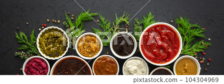 Sauces in bowls with seasonings 104304969