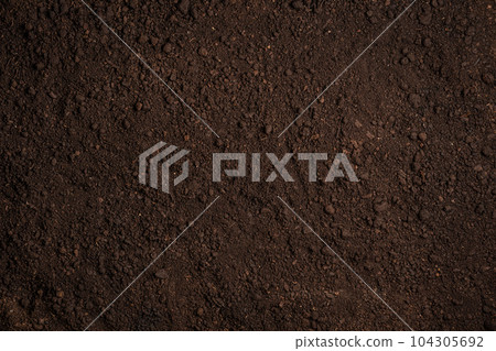 Fertile soil background. 104305692