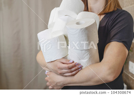 People are stocking up toilet paper for home quarantine from coronavirus 104308674