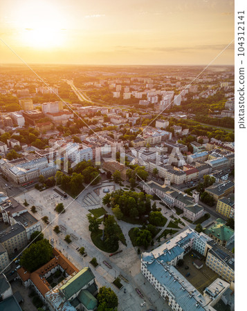 downtown plac litewski, city square and park at sunset, Lublin, Poland downtown plac litewski, city square and park at sunset, Lublin, Poland 104312141
