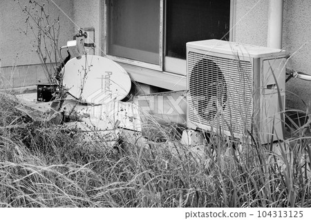 Ruined apartment and oversized garbage monochrome 104313125