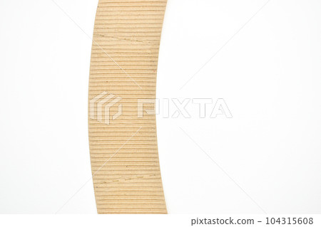 closeup brown paper cardboard texture on white background closeup brown paper cardboard texture on white background 104315608