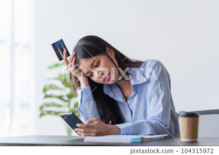 Young asian woman worried about credit card debt, stress, problem, finance, bankruptcy 104315972