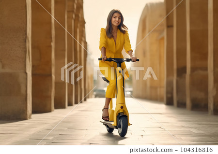 Full-length body size side profile photo of a cheerful girl riding scooter on vibrant color background Full-length body size side profile photo of a cheerful girl riding scooter on vibrant color background 104316816