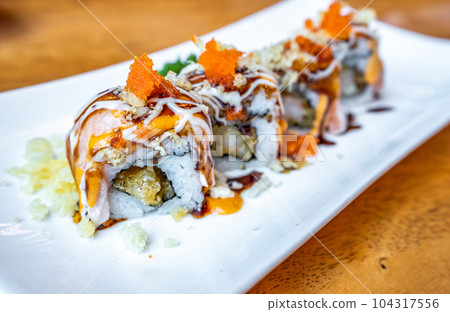 salmon roll sushi in Japanese restaurant, Japanese Food salmon roll sushi in Japanese restaurant, Japanese Food 104317556