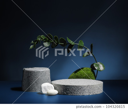 Stone pedestal stage product display background with nature moss on navy color.zen like backdrop Stone pedestal stage product display background with nature moss on navy color.zen like backdrop 104320815