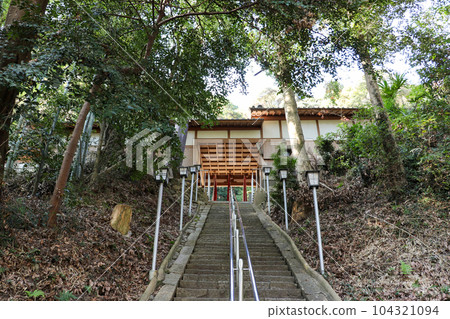 Long stone steps leading to a shrine 104321094