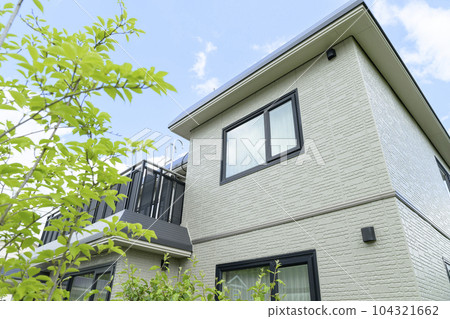 Completion of house renovation House wall after exterior wall painting Completion of house renovation House wall after exterior wall painting 104321662