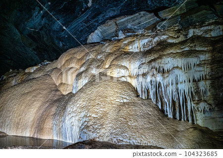 Limestone cave of stalactite and stalagmite formations, Gruta da Lapa Doce Cave, Chapada Diamantina in Bahia, Brazil. Limestone cave of stalactite and stalagmite formations, Gruta da Lapa Doce Cave, Chapada Diamantina in Bahia, Brazil. 104323685