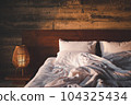 messy bed in the morning 104325434