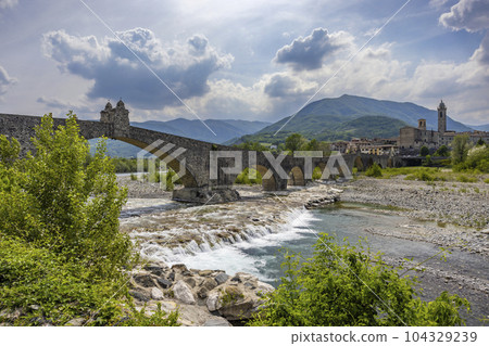 Gobbo Bridge also Devil Bridge or Ponte del Diavolo or Ponte Gobbo in Bobbio, Piacenza province, Trebbia Valley, Emilia Romagna, Italy Gobbo Bridge also Devil Bridge or Ponte del Diavolo or Ponte Gobbo in Bobbio, Piacenza province, Trebbia Valley, Emilia Romagna, Italy 104329239