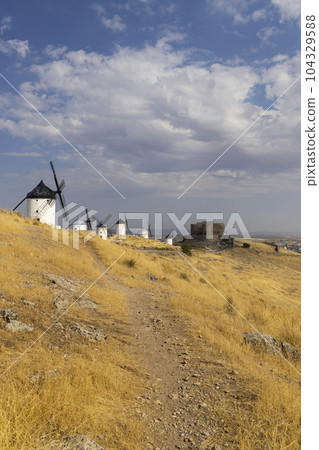 windmills and castle of Consuegra, Castilla La Mancha, Spain 104329588