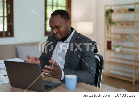 african american man, video call and laptop, wave hello and meeting, consulting or internet planning in startup company. Happy worker greeting for online meeting, computer webinar. african american man, video call and laptop, wave hello and meeting, consulting or internet planning in startup company. Happy worker greeting for online meeting, computer webinar. 104330132