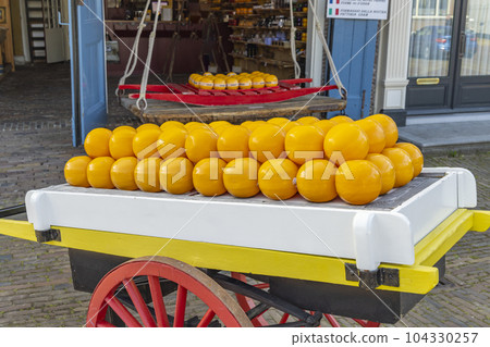 Detail of edam cheeses, town cheese market, Edam, North Holland, Netherlands Detail of edam cheeses, town cheese market, Edam, North Holland, Netherlands 104330257