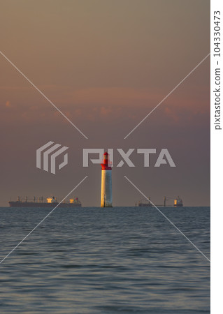 Phare de Chauvea near Ile de Re with ships to La Rochelle, Pays de la Loire, France 104330473