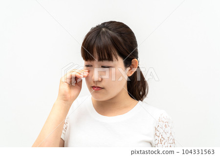 A sad and crying woman 104331563