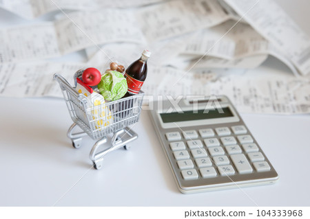 Shopping cart with food, calculator, receipt household budget money image 104333968