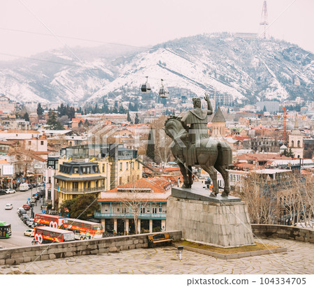 Tbilisi, Georgia, Famous Landmark Equestrian Statue Of King Vakhtang Gorgasali near Metekhi church. Gorgasali monument in Georgian Capital.. 104334705
