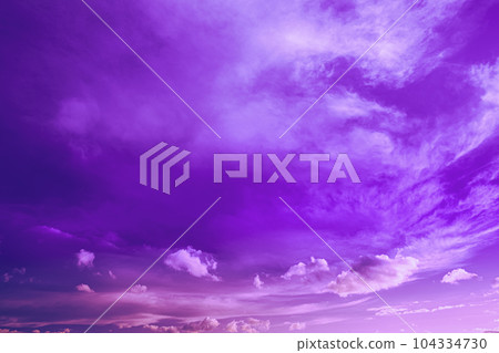 Sky And Fluffy Clouds, Bright Cloudscape Background. Bright Dramatic Cloud Sky In Magenta Colours. Amazing Colorful Pink Clouds. Unusual Abstract Toned Sky Background. Soft Pink, Purple Colors 104334730